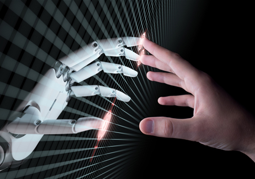 A human hand reaching out to meet an artificial intelligence robotic hand