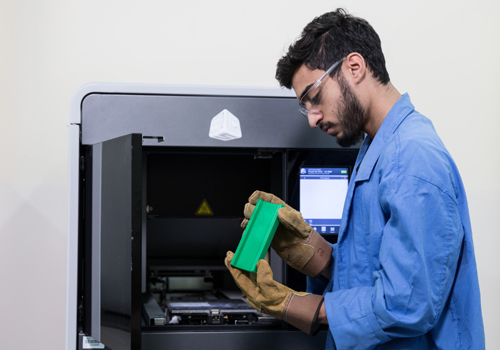 Mechanical student analysing machinery