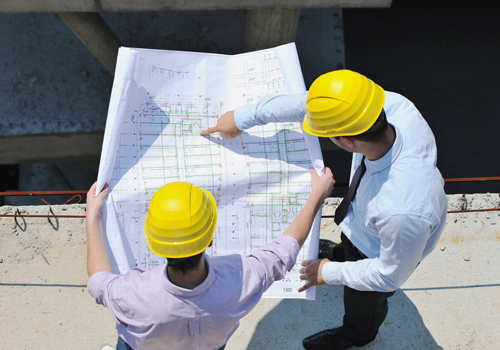 MEM students on site reviewing plans