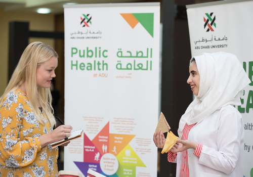 Public Health Degree student discussing  public health with an individual